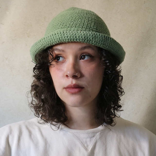 Handmade crochet bucket hat in Green worn — MARVES New York customer